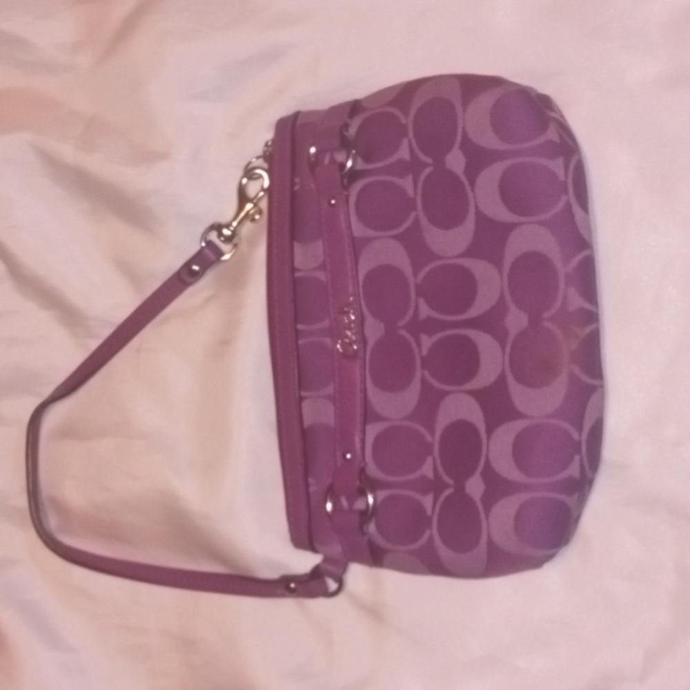 SOLD Coach signature pouch